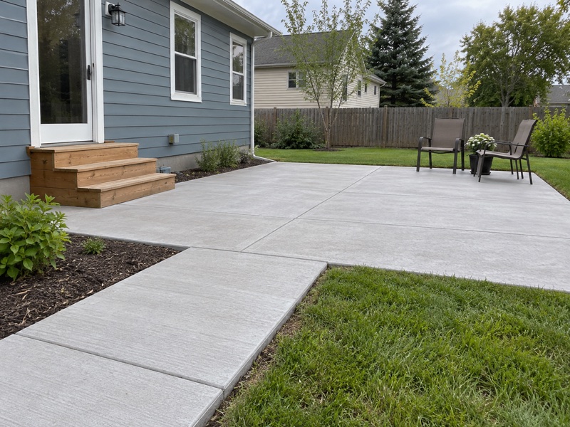 Finished concrete patio and connecting walkway