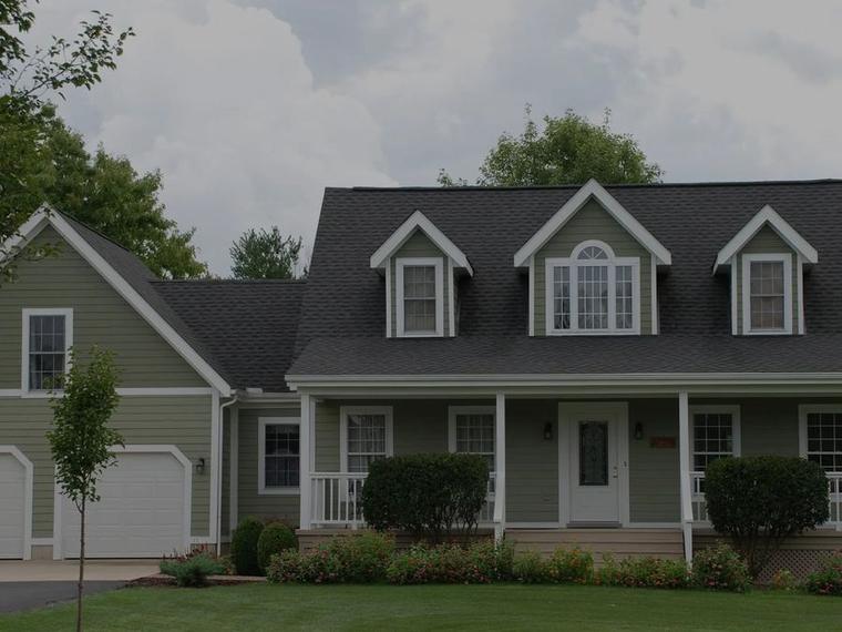 The exterior siding of a Green Bay home cleaned by Two Guys USA